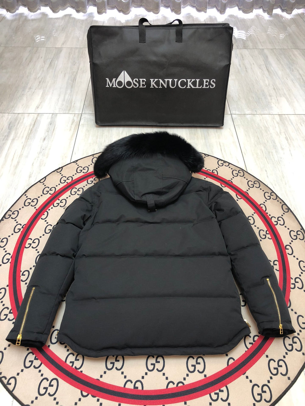 Moose Knuckles Men's Black Hooded Jacket with Gold-Tone Details